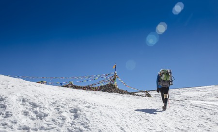 Woman hiker on a top of a mountainの写真素材