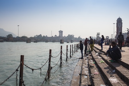 A view of  holy ghats of Varanasi with a boatman sailingのeditorial素材