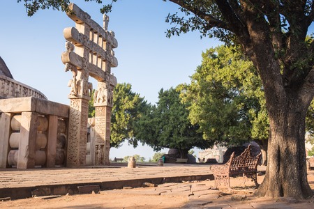 Bench under the tree in the Indiaの写真素材