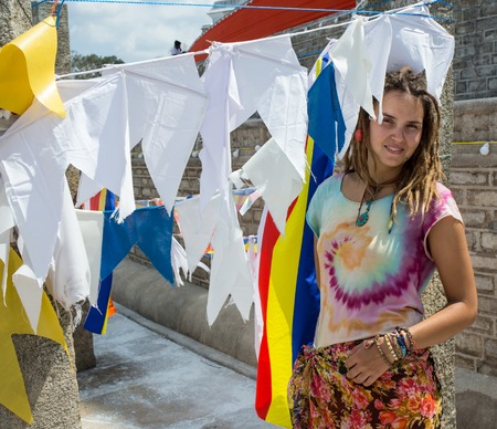Woman Practicing Yoga by the Sea. Rear View. Double Exposure Filtered Photo with Bokeh. Soul Concept.の写真素材