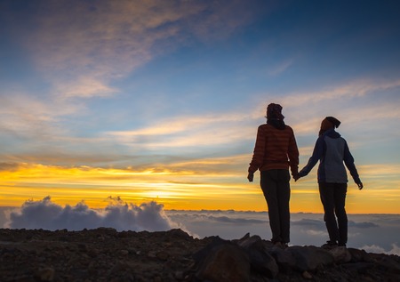 Couple in love silhouette during sunset -  touching nosesの写真素材
