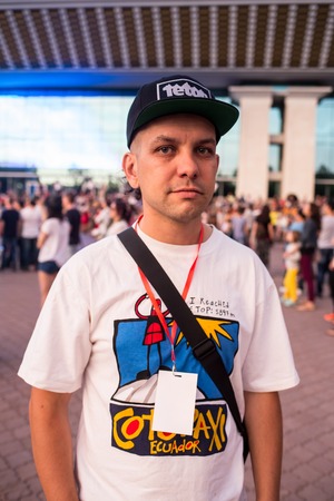 Freedom concert portrait of cool man posing alone and having fun,feels good,man teen hipster outfit, posing on sunset background,bright summer toned portrait.tongue,look good,happinessのeditorial素材