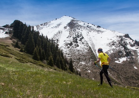 ALMATY, ALMATY DISTRIKT,KAZAKHSTAN - MAY 22, 2016: Open competition SKY RANNING 2016 held in Eliksay gorge. A girl runs up to the mountain named Bukreeva participating in the competition.のeditorial素材