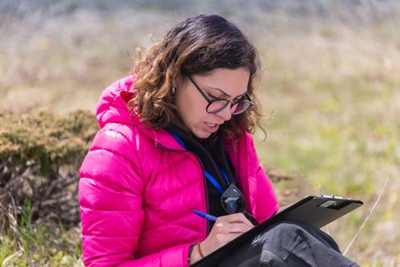 ALMATY, ALMATY DISTRIKT,KAZAKHSTAN - MAY 22, 2016: Open competition SKY RANNING 2016 held in Eliksay gorge. A girl runs up to the mountain named Bukreeva participating in the competition.のeditorial素材