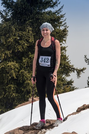 ALMATY, ALMATY DISTRIKT,KAZAKHSTAN - MAY 22, 2016: Open competition SKY RANNING 2016 held in Eliksay gorge. A girl runs up to the mountain named Bukreeva participating in the competition.のeditorial素材