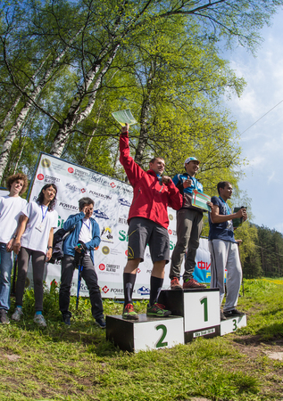 ALMATY, ALMATY DISTRIKT,KAZAKHSTAN - MAY 22, 2016: Open competition SKY RANNING 2016 held in Eliksay gorge. Awarding of the winners of the race, prizesのeditorial素材