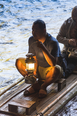 BANGKOK/THAILAND - FEBRUARY 10 2016: Novice monk being loy kratoactivity on the ship in pagoda.のeditorial素材
