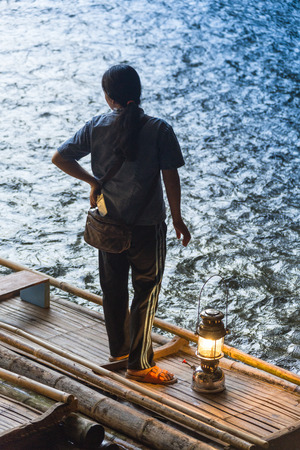 BANGKOK/THAILAND - FEBRUARY 10 2016: Novice monk being loy kratoactivity on the ship in pagoda.のeditorial素材