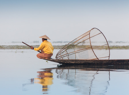 INLE LAKE/MYANMAR-FEBRUARY 10 2016: Silhouette of fisherman at sunset Inle Lake Burma Myanmarのeditorial素材