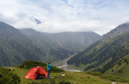 View from inside a tent on mountains landscape. Camping concept.の写真素材
