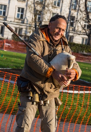 GERMANY, FRANKFURT: 12 DECEMBER 2016 - European street musicians who sitting on the pedestrian streets and playing music for charity.のeditorial素材