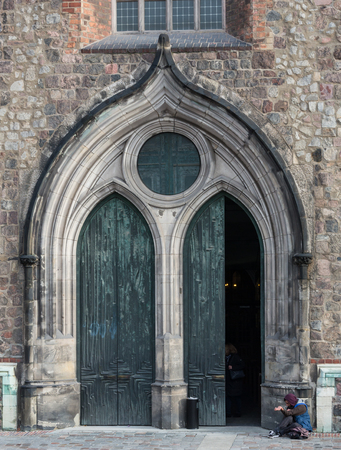 LITVA, VILNIUS - NOVEMBER 02 2016: Entrance to the medieval church of Saint John in Cesis. This public church is the oldest medieval architectural monument in Latvia, it was built at the beginning of 13th centuryのeditorial素材