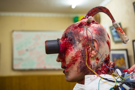 Close-up portrait of a horrible scary zombie man. Horror. Halloween.の写真素材