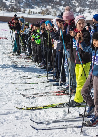 ALMATY, KAZAKHSTAN - FEBRUARY 18, 2017: amateur competitions in the discipline of cross-country skiing, under the name of ARBA Ski Fest. A large number of people start simultaneously.のeditorial素材