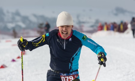 ALMATY, KAZAKHSTAN - FEBRUARY 18, 2017: amateur competitions in the discipline of cross-country skiing, under the name of ARBA Ski Fest. A man cross-country skiing on the trail in Almaty mountのeditorial素材