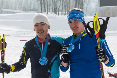 ALMATY, KAZAKHSTAN - FEBRUARY 18, 2017: amateur competitions in the discipline of cross-country skiing, under the name of ARBA Ski Fest. The joy at the finish of the competitionのeditorial素材