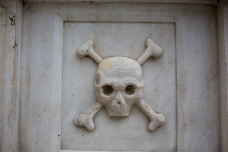 Skull and bones on the tomb in Bulgariaの写真素材