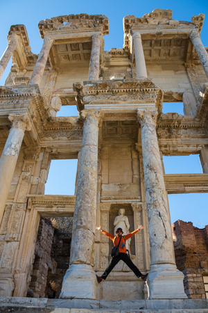 a tourist man is taking Ephesus Celsus Librarys photoの写真素材