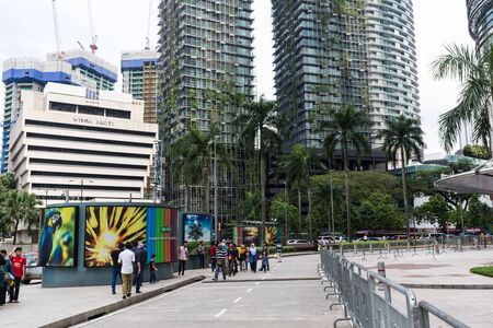 KUALA LUMPUR. 2017, 16th February, Tourists walking on the street market of Petaling, Kuala Lumpur, Malaysiaのeditorial素材