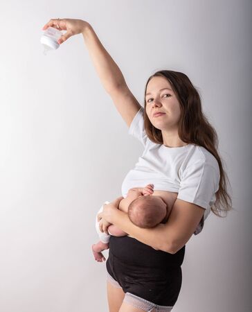 mother feeding baby soft focusの写真素材