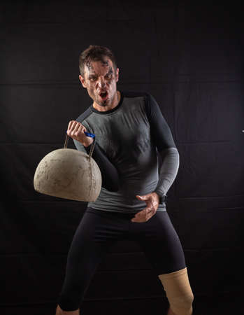 Handsome Athletic Men Exercising With big Kettlebellの写真素材