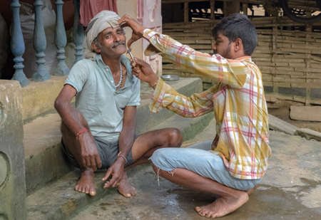 Amazing photo showing father son relationship of love and care. in family. Young Son helping his...
