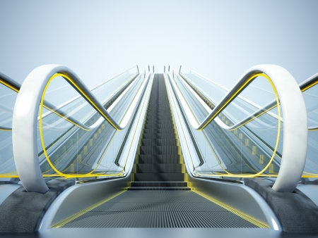 Close-up of the modern escalator on the blue sky backgroundの写真素材