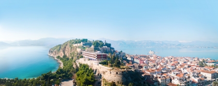View from the Palmidi Fortress down to the old area of the city of Nafplion Nauplia and the Argolic Gulf with the fortress island Bourtzi  Nafplion is situated on the peninsula Peloponnese in Greece and is said to be the most popular city of the greek popのeditorial素材