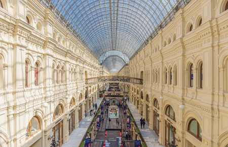 MOSCOW - MAY 18: Interior of the Main Universal Store (GUM) on May 18, 2014 in Moscow. Gosudarstvenny Universalny Magazin (GUM) (lit. - State Department Store), the large 3-story shopping center and great example of Russian architecture by Vladimir Shukhoのeditorial素材
