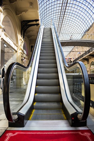 MOSCOW - MAY 18: Escalator in the Main Universal Store (GUM) on May 18, 2014 in Moscow. GUM is the large store in the Kitai-gorod part of Moscow facing Red Square. It is currently a shopping mall.のeditorial素材