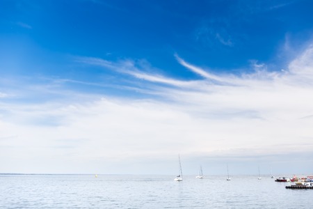 Sea and the sailboats at good weatherの写真素材