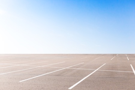 Empty outdoor car park on the sky backgroundの写真素材