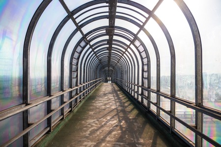 Glazed overground pedestrian crossing, view from the insideの写真素材