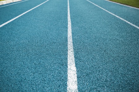 Blue lanes on a running trackの写真素材