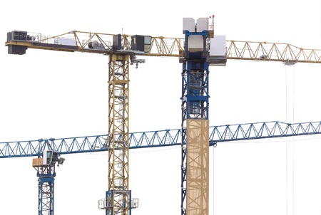 Three construction cranes on the white backgroundの写真素材