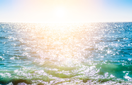 Sparkling rippled water surface in bright blue colorsの写真素材