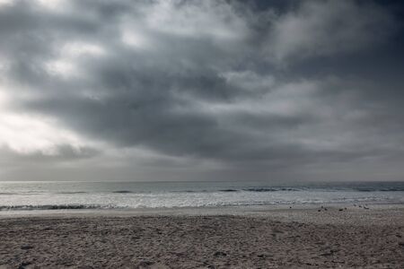 Beach of the Pacific ocean during dull weather in Chileの写真素材