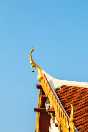 Thai temple roof on the blue skyの写真素材