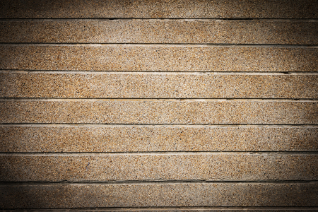 Pattern and texture on the old gravel wall backgroundの写真素材