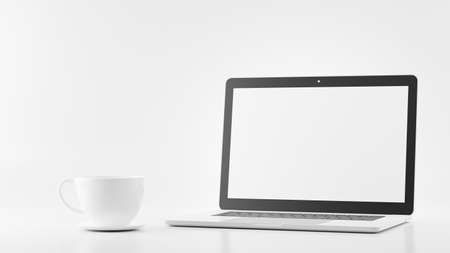3d render of laptop with white mug coffee for your mockup designの写真素材