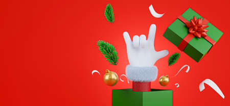 3d render of santa claus hand emerging from a gift box for product displayの写真素材
