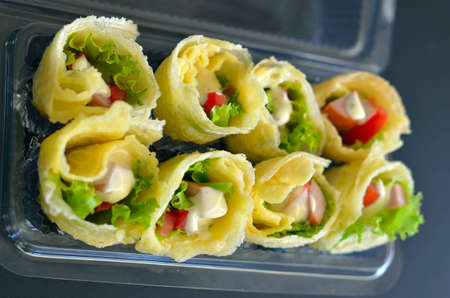 Pancakes with stuffing and Saladの写真素材