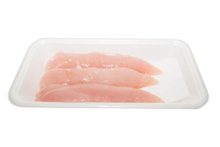 Fresh Chicken meat on white plateの写真素材