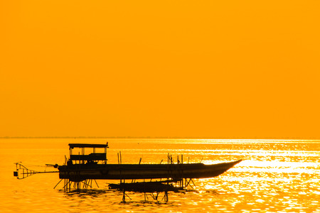 Boat freshwater lake sunset Cambodiaの写真素材