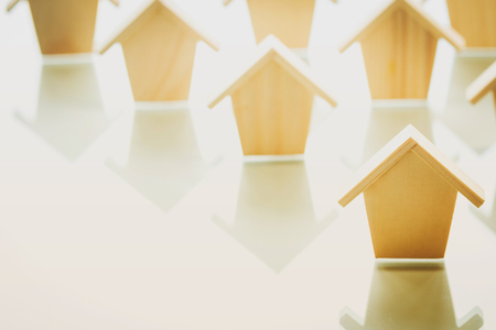 Houses in row of wooden for choose, Searching buying a new home and real estate concept.の写真素材