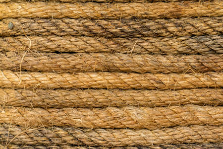 Old brown rope is twist for background texture.の写真素材