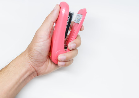 stapler on handの写真素材