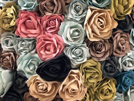 colorful of blossom rose flowers paper craft art abstract background and textureの写真素材
