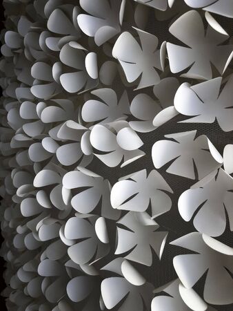 Flowers made of paper are handicrafts decorative crafts on the walls  abstact background black and white  colorの写真素材