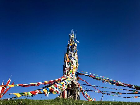 buddhism colorful prayer flags symbol od spirtual belive of Tibetan traditinal on the mountain with...